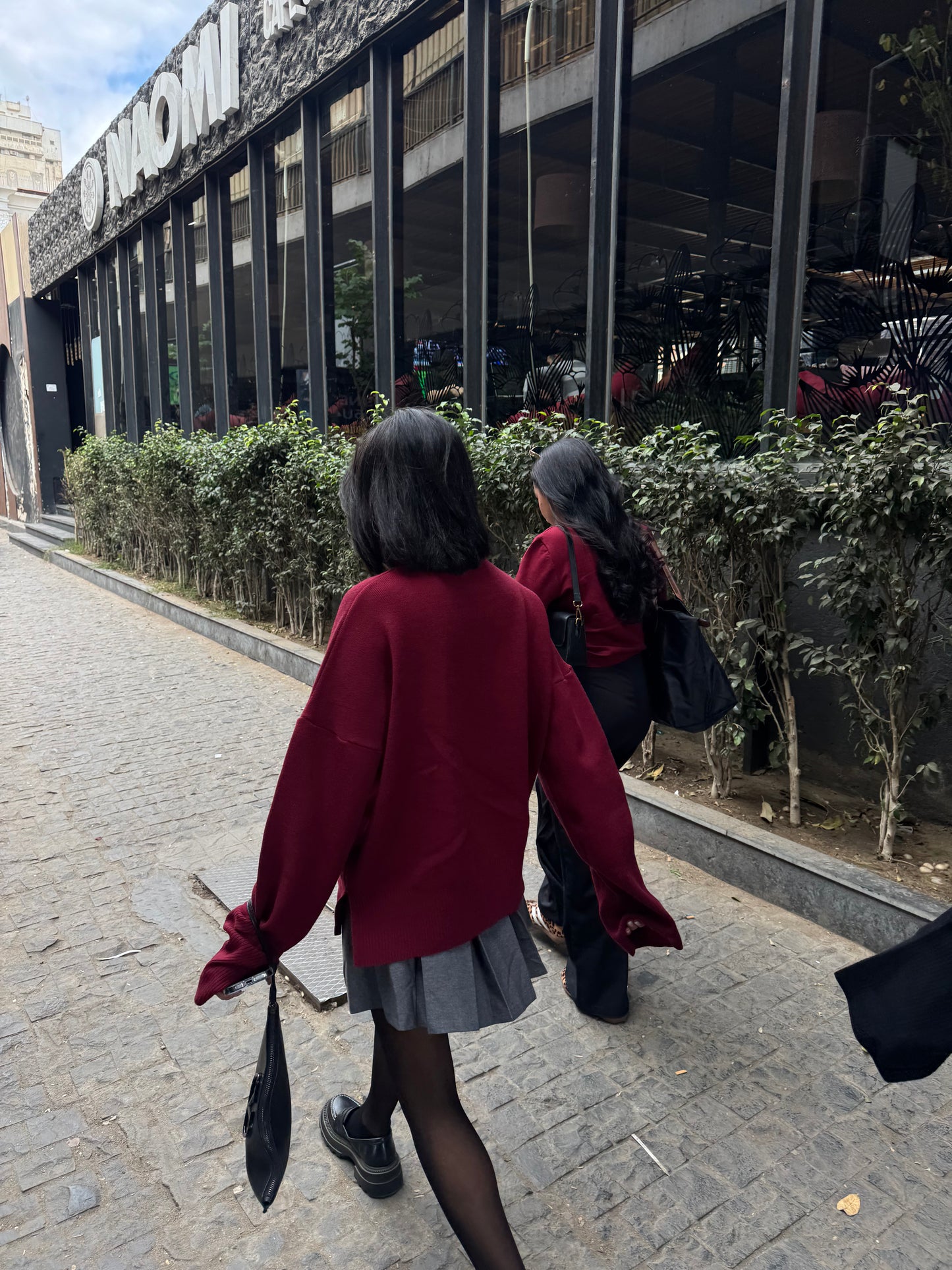 The gray pleated skirt