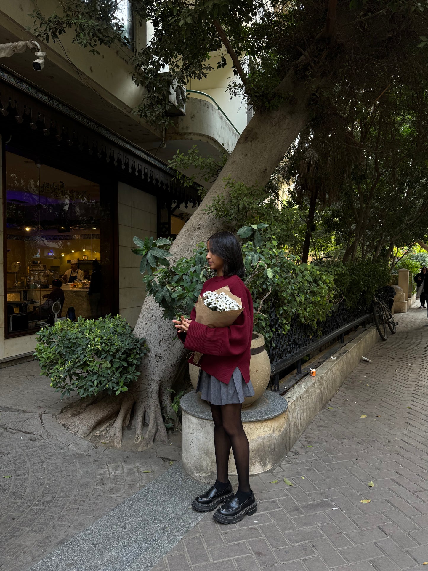 The gray pleated skirt