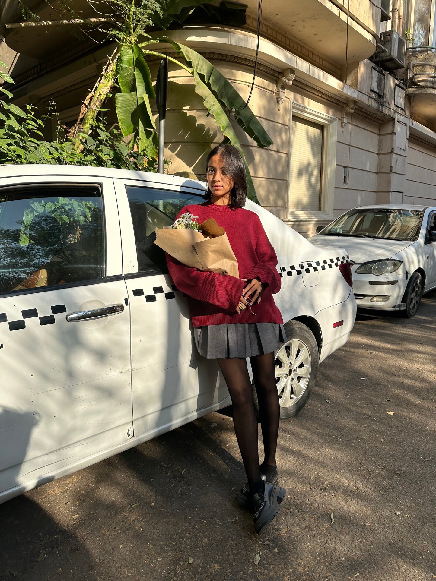 The gray pleated skirt