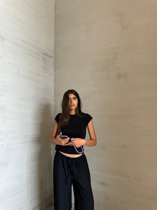The black double lined top